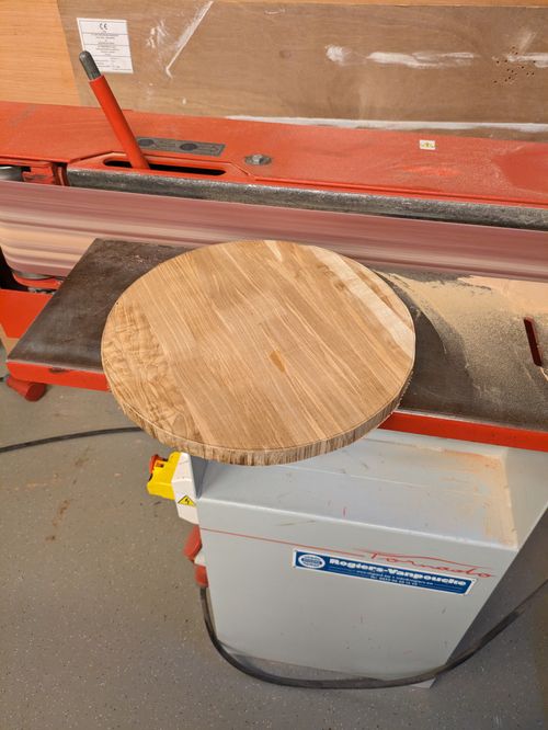 Rounding the board with the belt sander